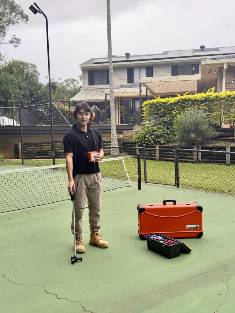 Max Leak Detection technician using acoustic leak detection equipment, servicing Sherwood